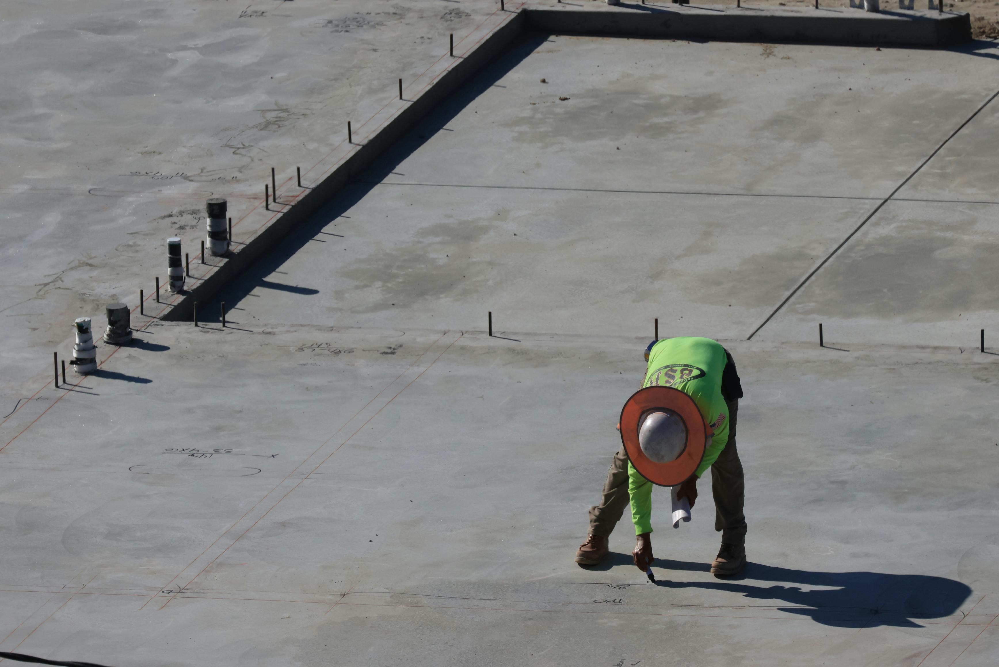 Concrete flatwork and surface finishing for a commercial or industrial site